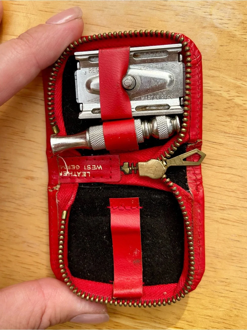 Vintage red Gillette travel safety razor kit